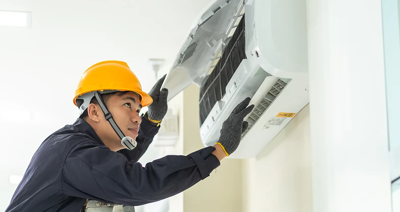 Male Technician Repairing Air Conditioner Safety Uniform Indoors 1